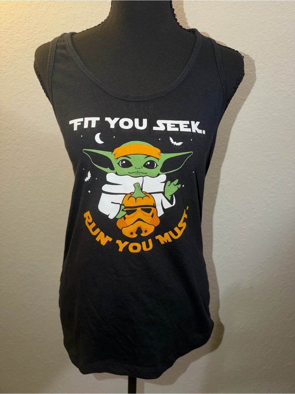 Black Graphic Tank Top with Green Character and Orange Accents - Women